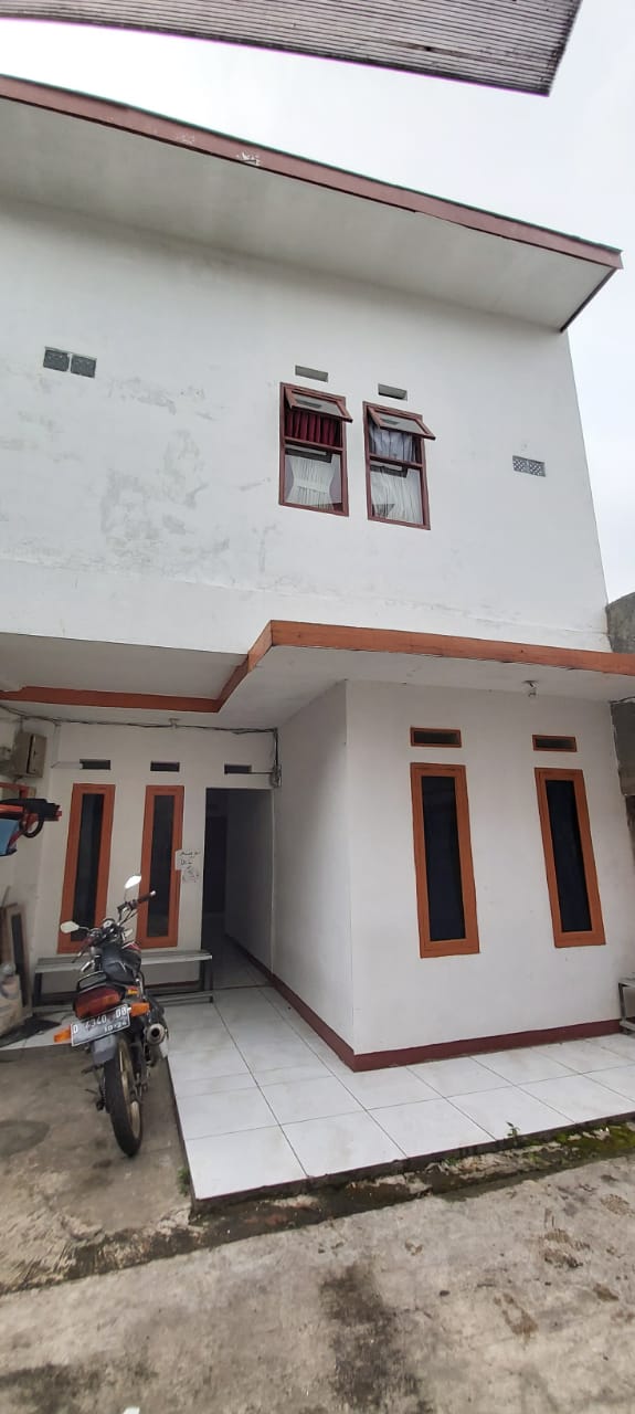 Kost an tengah kota