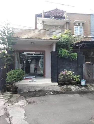 Dijual rumah 2 lantai dan Toko Strategis di Monang maning 